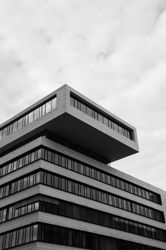 grayscale photo of concrete building