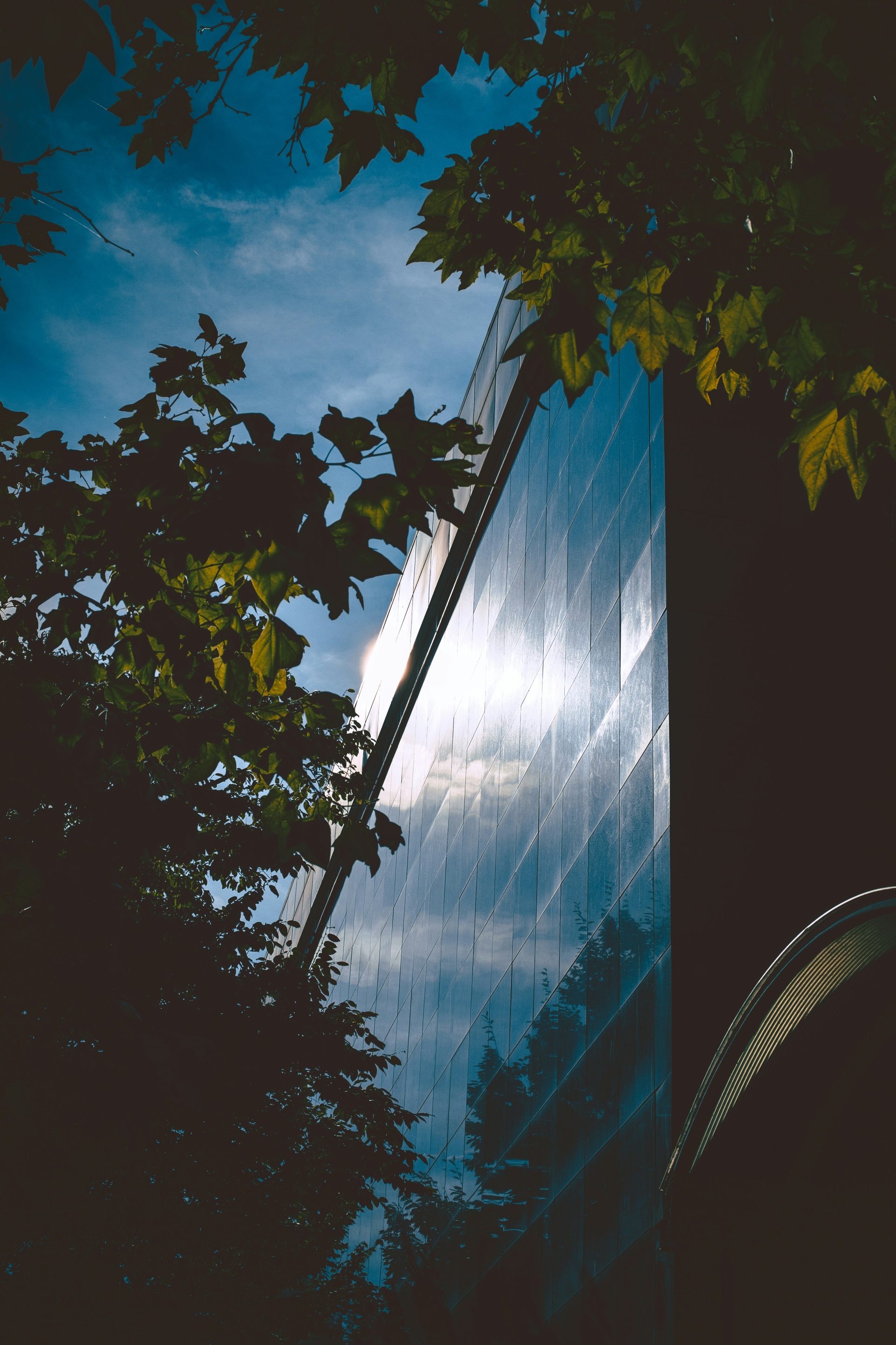 The reflection of a building in the windows of another building